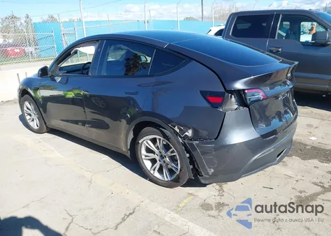 2023 Tesla Model Y Awd/Long Range Dual Motor All-Wheel Drive z USA, uszkodzony, nr VIN 7SAYGDEE3PF865229